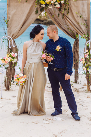Beautiful couple near the ocean, honeymoon romantic coupleの写真素材