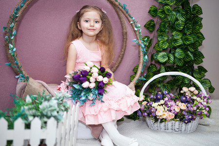 happy womens day for my mom, little girl holds flowers tulipの写真素材