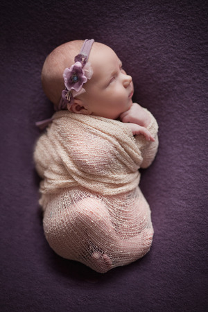Newborn baby at background, Your care and love most important for little babyの写真素材