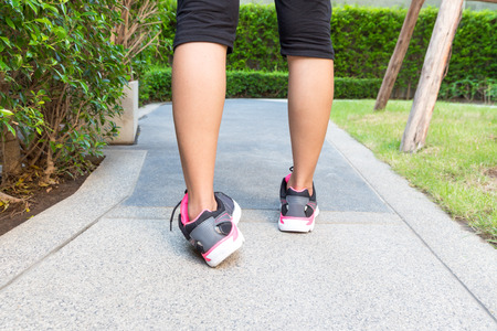 Ankle sprain while jogging or running conceptの写真素材