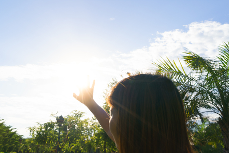 Asian woman in hot summer - heat stroke conceptの写真素材