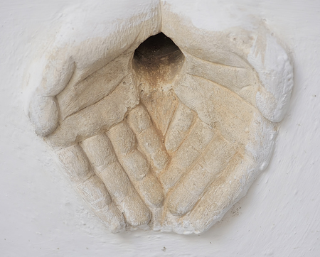 gargoyle of a house in the old town of Martina Franca, Puglia - Italyの写真素材