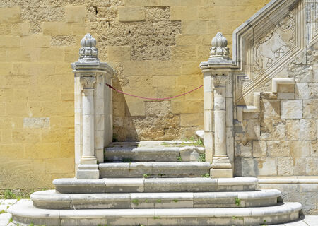 Detail stone staircase in the courtyard of the Swabian castle of Gioia del Colle - Apulia, Italyの写真素材