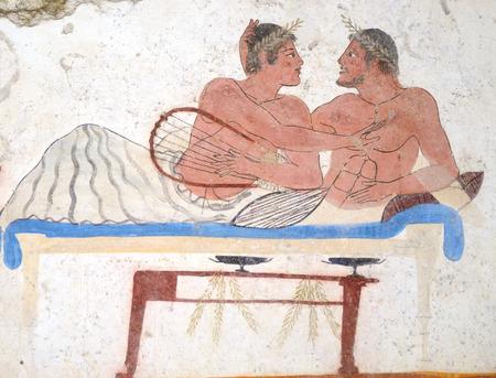 Detail ancient Greek Fresco in Paestum, Italy, called the "Tomb of the Diver" depicting men during a banquet.の写真素材