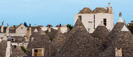 Trulli village in Alberobello, Italy. The style of construction is specific to the Murge area of the Italian region of Apulia (in Italian Puglia). Made of limestone and keystone.の写真素材