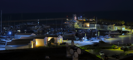 Tourist harbor of Rodi Gargano night.の写真素材