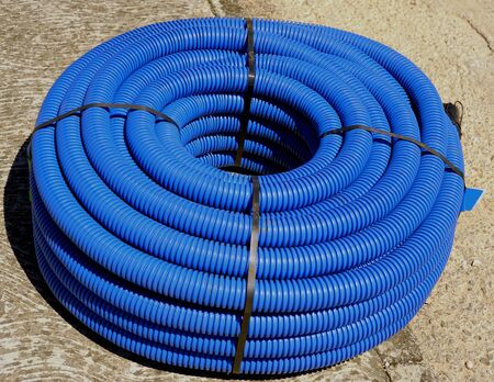 roll of corrugated conduit for microtrench in urban areasの写真素材