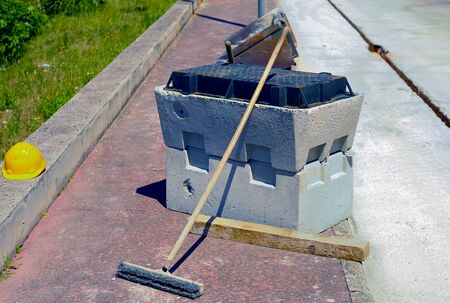 pit block precast concrete, helmet and scrubbing brush