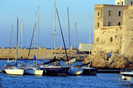 Yacht marina. Lots of beautiful yachts moored.の写真素材
