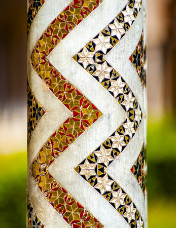 Detail the columns of the courtyard gallery Monreale Cathedral (Duomo di Monreale) near Palermo, Sicily, Italy. UNESCO Heritage siteHave different tiled tracery and shapeの写真素材