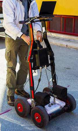 The GPR is a noninvasive method used in geophysics. It is based on the analysis of electromagnetic waves transmitted into the ground reflections.
It is also used for the detection of underground pipes in the city streets before starting excavations.の写真素材