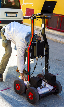 The GPR is a noninvasive method used in geophysics. It is based on the analysis of electromagnetic waves transmitted into the ground reflections.
It is also used for the detection of underground pipes in the city streets before starting excavations.の写真素材