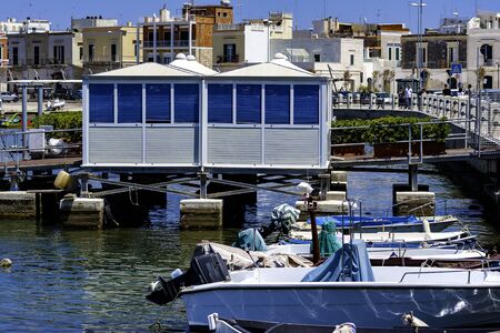 Bari, ITALY - 28 May 2017: Pleasure boats anchored in a berth at a port in Bari. The boats are still protected with towels because the summer season has not startedのeditorial素材