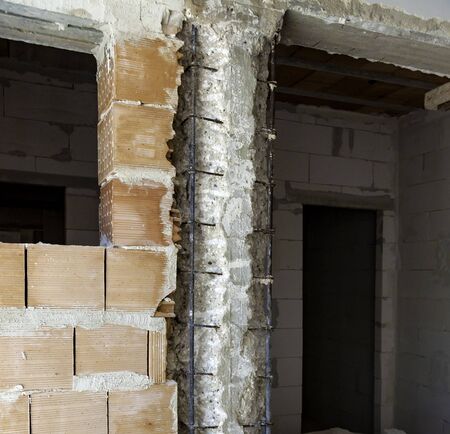 Pillar with demolition of degraded concrete for subsequent reconstruction of the reinforced concrete structureの写真素材