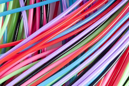 woven texture of colored tubesの写真素材