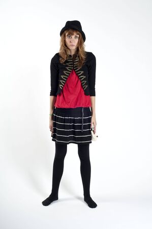 masked blonde girl posing on white backgroundの写真素材