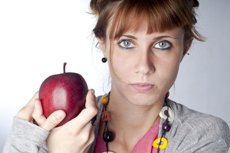girl with apple on white backgroundの写真素材