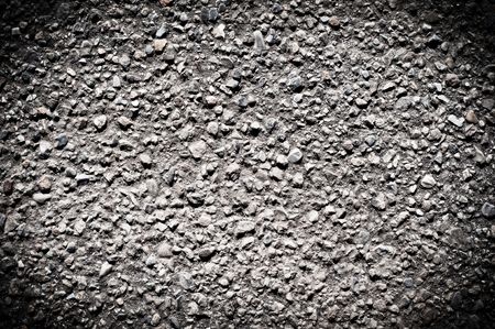 wall texture and asphalt with vignetteの写真素材