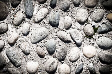 wall texture and asphalt with vignetteの写真素材