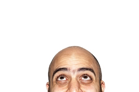 half funny face expression looking on white backgroundの写真素材