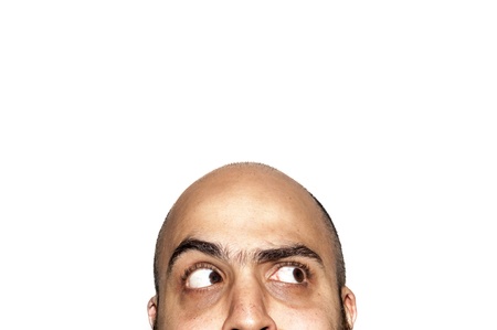 half funny face expression looking on white backgroundの写真素材