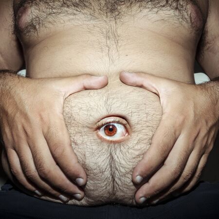 monstrous belly fat of dirty manの写真素材