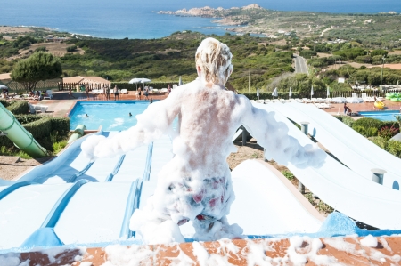 people who slip from the water park slides in summertimeのeditorial素材