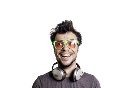 Crazy guy with headphones on white backgroundの写真素材