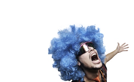 Crazy guy with blue wig on white backgroundの写真素材