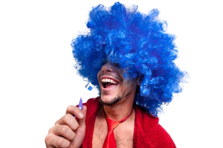 crazy guy with a toothbrush, wig and bathrobe singing on white backgroundの写真素材