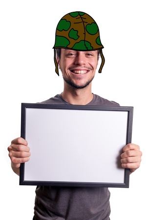 fanny smiling guy showing sign with helmet soldier on white backgroundの写真素材