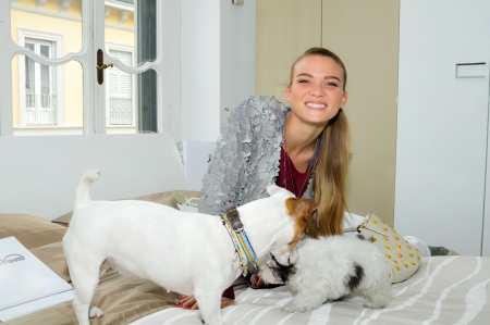 MILAN, ITALY - APRIL 19  Fiammetta Cicogna poses in Milan April, 19 2012  Fiammetta Cicogna, young famous italian model, actress and tv presenter, poses for photographers with her dogのeditorial素材