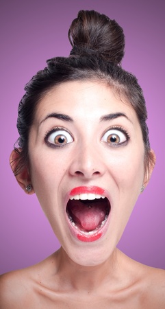 puppet screaming girl with big head on pink backgroundの写真素材