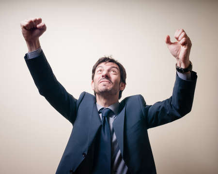 success winner businessman on white backgroundの写真素材
