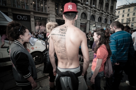 MILAN, ITALY - MAY 1: labor day held in Milan on May 1, 2013. Every year thousands of people taking to the streets to celebrate labor day and to protest against italian austerityのeditorial素材