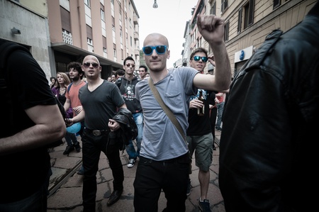 MILAN, ITALY - MAY 1: labor day held in Milan on May 1, 2013. Every year thousands of people taking to the streets to celebrate labor day and to protest against italian austerityのeditorial素材