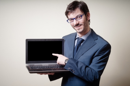 businessman with notebook on gray backgroundの写真素材