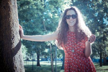eastern hipster vintage woman with shades at the parkの写真素材