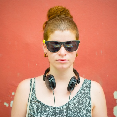 beautiful stylish modern young woman in the cityの写真素材