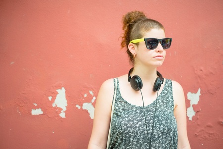 beautiful stylish modern young woman in the cityの写真素材