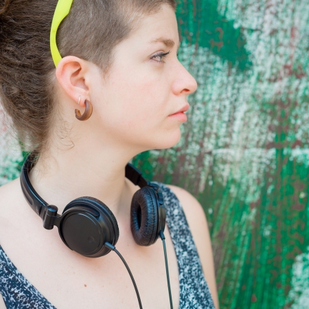 beautiful stylish modern young woman in the cityの写真素材