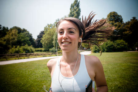 beautiful woman fitness running at the parkの写真素材