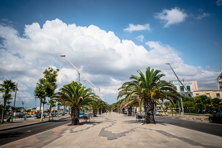 ALGHERO, ITALY - AUGUST 13: touristic city of Alghero on August, 13 2013. Alghero is a touristic Sardinia city called also Barceloneta. People speaks infact catalan dialect.のeditorial素材