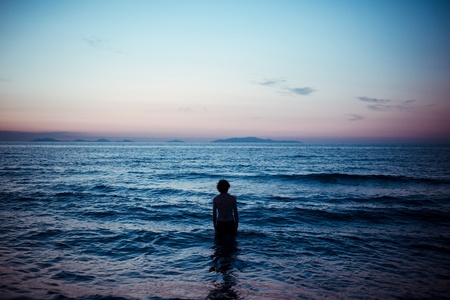 man silhoutte at sunset in summertime