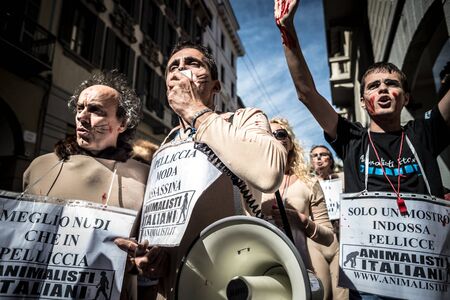 MILAN, ITALY - SEPTEMBER 17: Animalisti Italiani protest on September 17, 2013. Animal right association 'Animalisti Italiani' protest against furs and fashion, in famous fashion Milan street Monte Napoleoneのeditorial素材