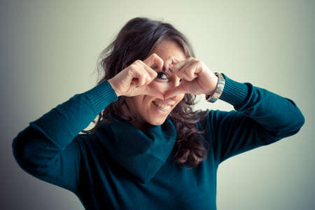 beautiful woman with turtleneck walking in the city autumnの写真素材