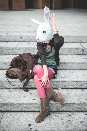 rabbit head woman in the cityの写真素材