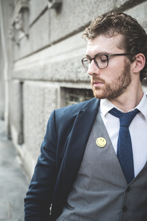 elegant attractive fashion hipster man lifestyle in the cityの写真素材