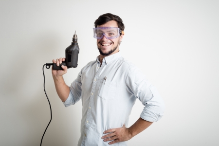 young man bricolage working at homeの写真素材