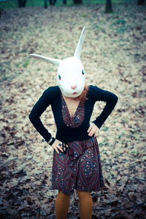rabbit mask unreal woman at the parkの写真素材